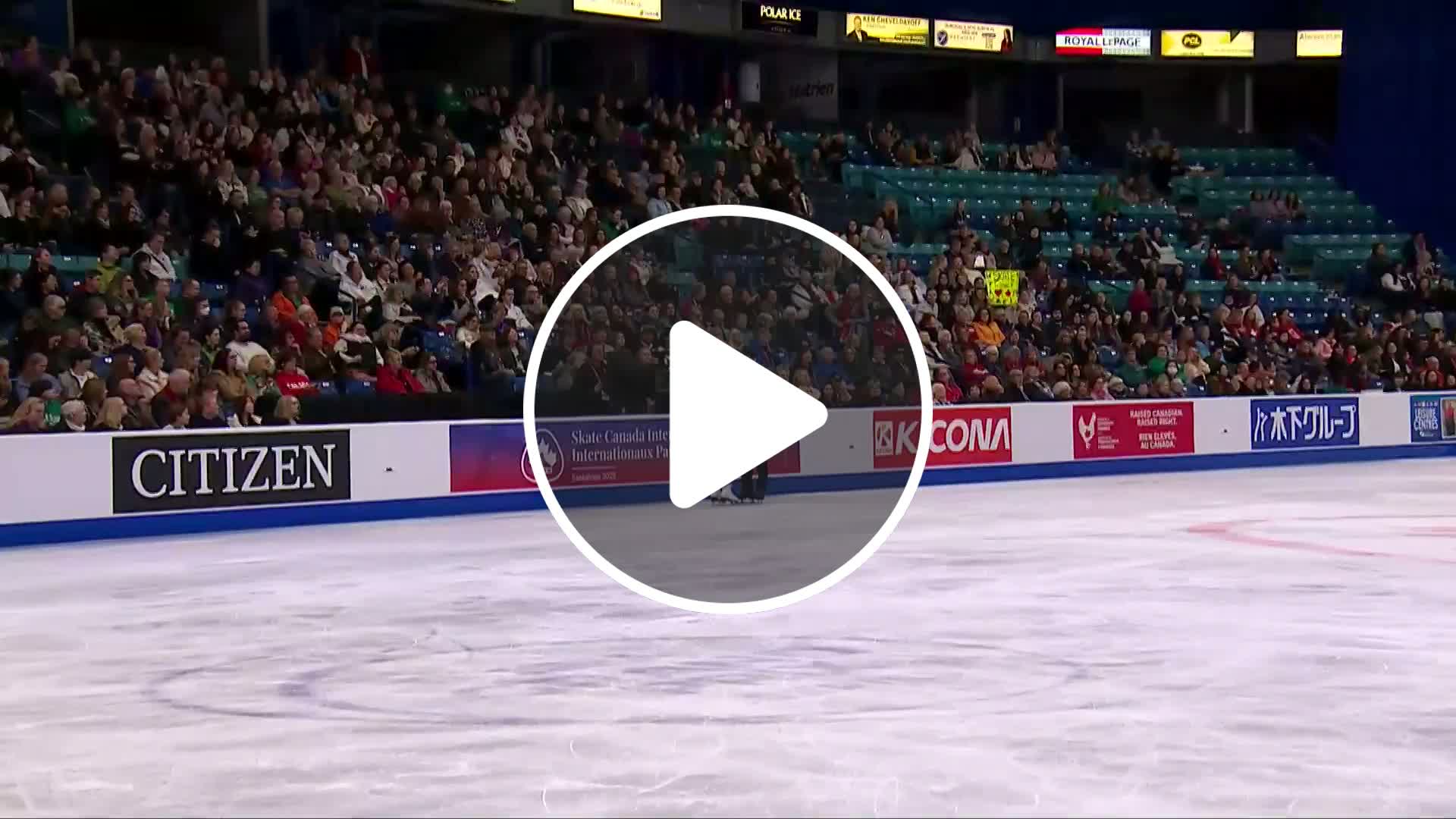 Canadian ice dancers Paul Poirier and Piper Gilles performing on ice